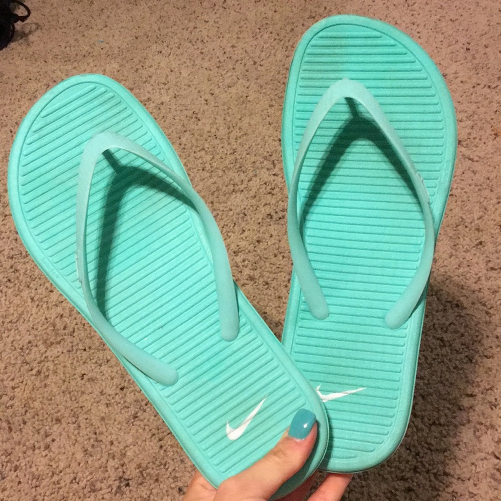 Mint Nike flip flops